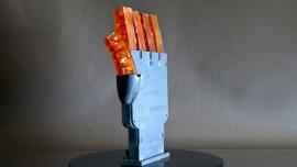 3D-printed hand with hydraulically controlled fingers that can cool itself by sweating.